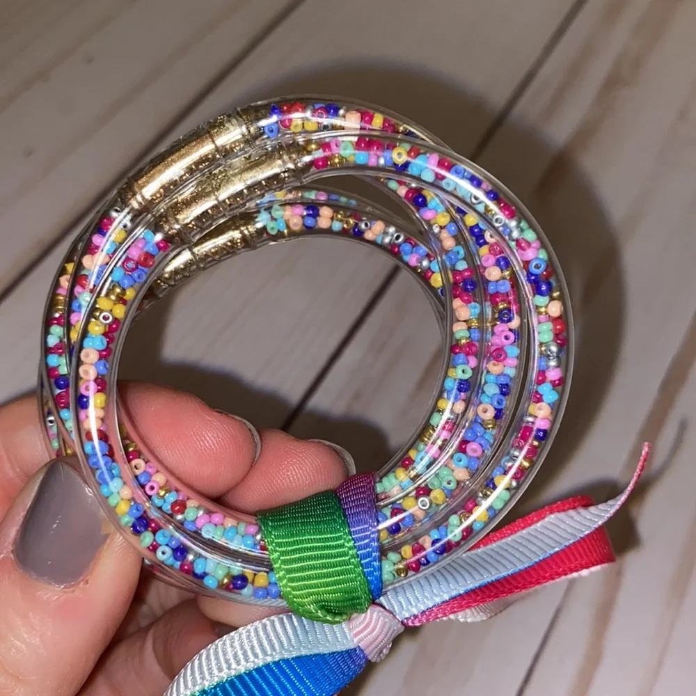 Little girls clear rubber rainbow confetti bracelets